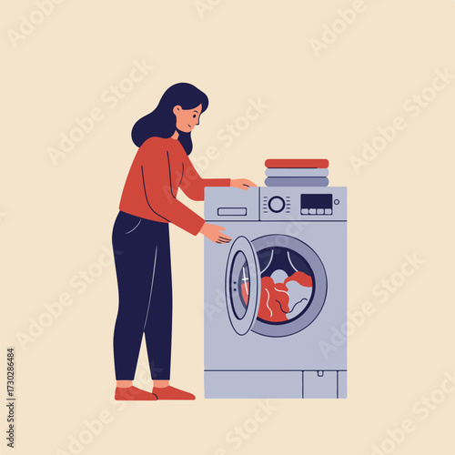 Woman loads colorful laundry into washing machine