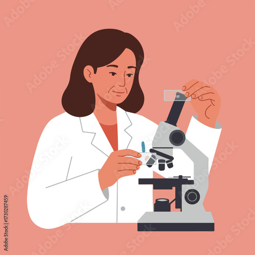 Scientist looking at microscope