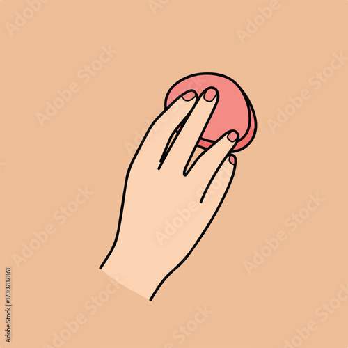 Hand holding a round pink sponge with black outline on beige backdrop