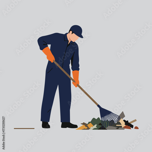 Man in coveralls with rake and gloves cleaning debris on grey background