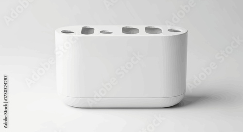 Minimalist white bathroom organizer or toothbrush holder on a plain surface