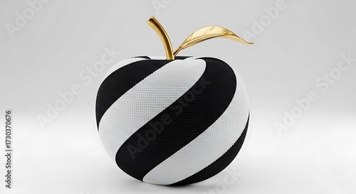 Striking black and white striped apple with a gleaming gold stem and leaf, symbolizing modern art and design.