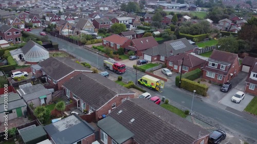 Drone. Fire engine and ambulance in urban street setting. 