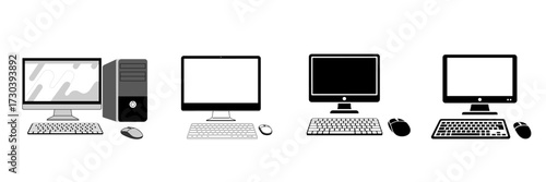 Four computer setups with monitors keyboards and mice