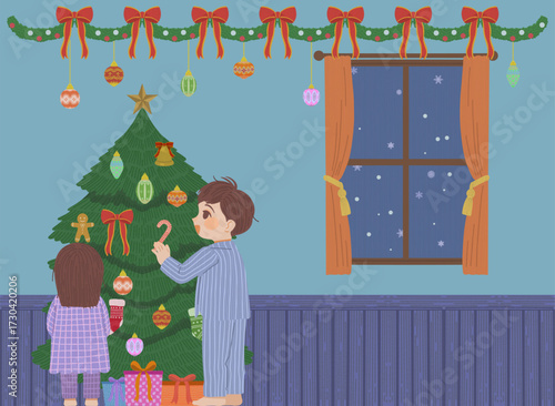 クリスマスの飾りつけをする男の子と女の子のイラスト