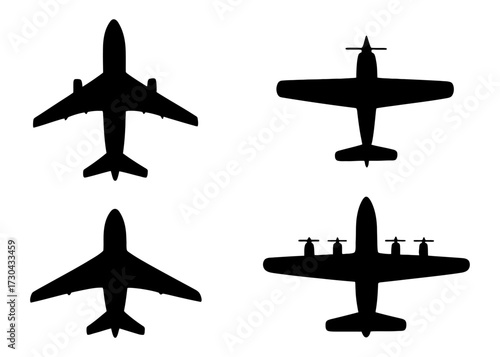 Four different airplane silhouettes are shown, each with a different design and style. The planes are all black. Vector. Silhouette illustration.