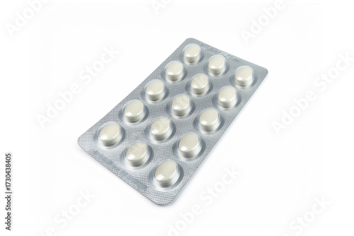 A close-up, high-angle shot of a rectangular blister pack of pills