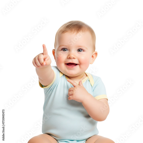 The baby is sitting and pointing