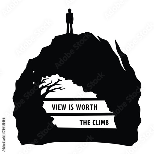 Silhouette of a man atop a mountain with motivational inscription and tree