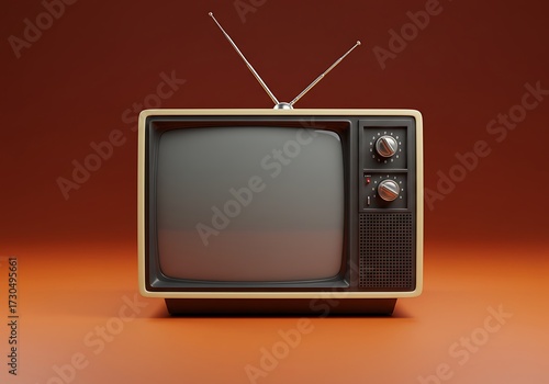 A classic vintage television set with rabbit ear antennas stands against a plain, warm-toned orange background.