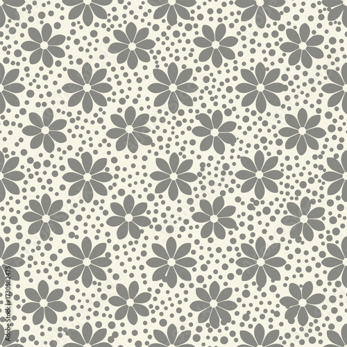 A charming repeating pattern of small grey flowers scattered across a speckled beige background.