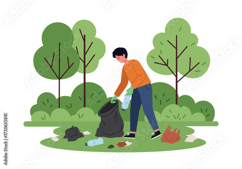 Person in park cleaning up litter by putting it into a trash bag