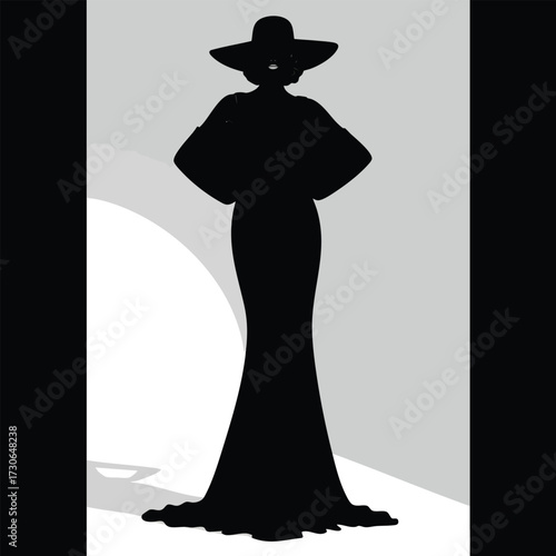Elegant silhouette of a woman in a long formal gown and a widebrimmed hat.