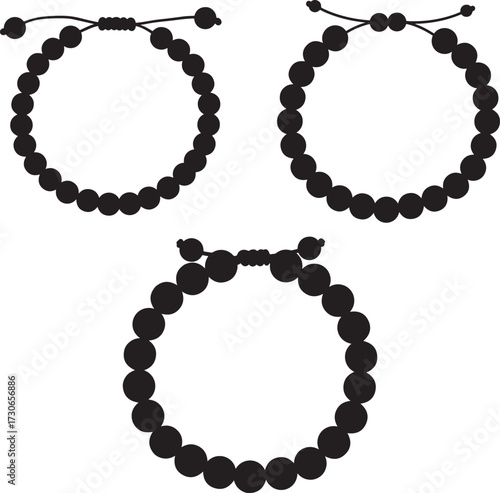 Three black beaded bracelets arranged in a pattern silhouette