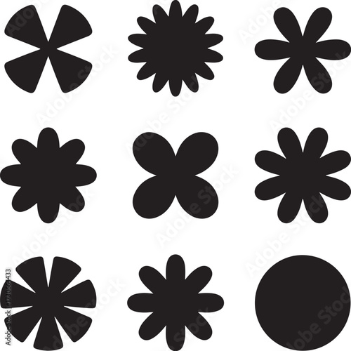 Minimalist black silhouettes of abstract floral shapes and circles for design elements