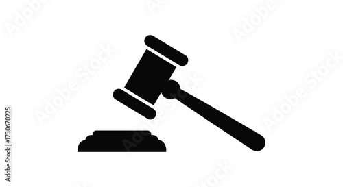 A black gavel resting on a sound block a striking silhouette