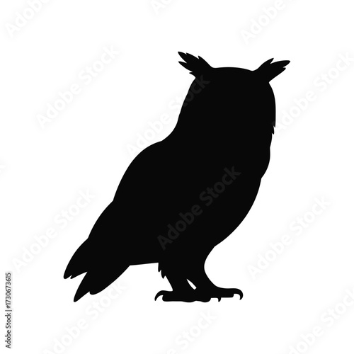 Silhouette of a great horned owl perched on a white background