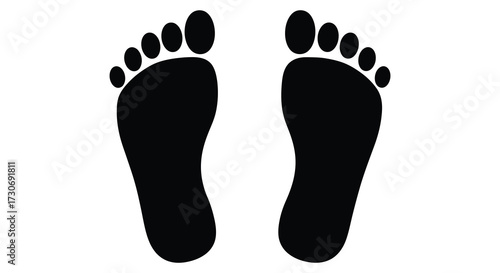 A pair of black footprints against a white background silhouette