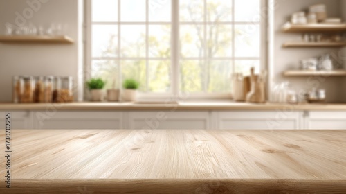 A wooden table surface in a cozy home kitchen with shelves holding glass containers and bowls,