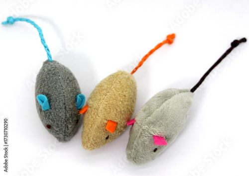 Three very cute soft mice toys for a cat isolated on white background. Top view