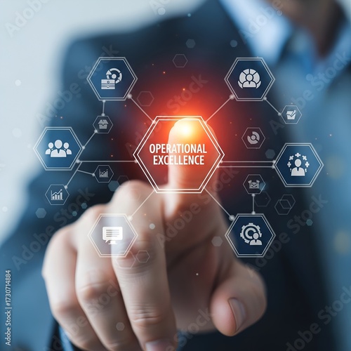 Businessman s finger touching a glowing digital network of business icons and data