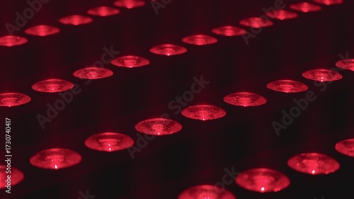 Powerful LED spotlights glowing in red, green, and blue tones, projecting stunning effects that transform the stage into a colorful visual spectacle.