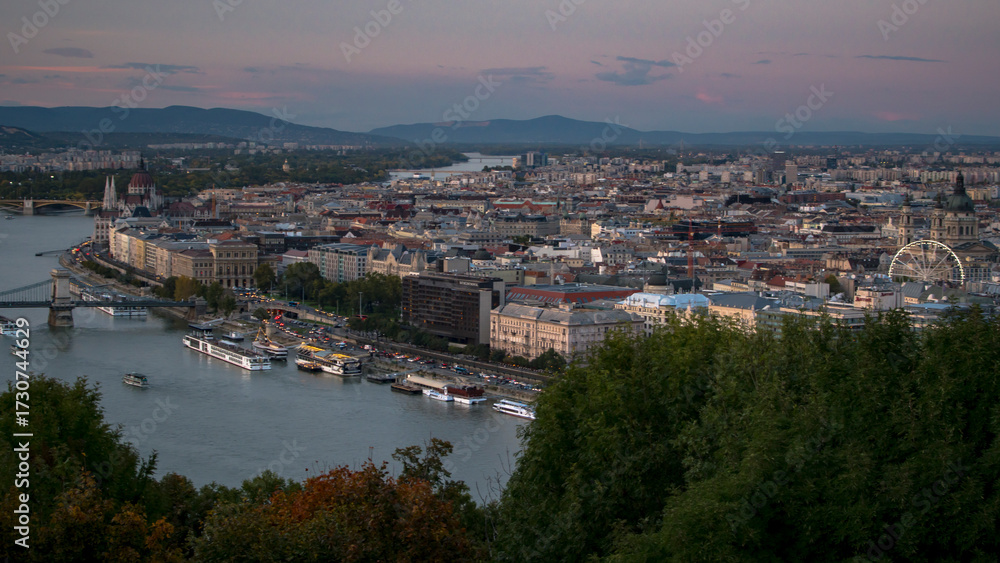 Obraz premium Tram and cruise ships near the Hungarian Parliament in Budapest