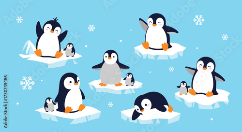 Cute cartoon penguins enjoying the winter weather and snow.