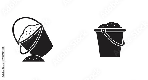 Two black bucket icons one spilled with contents on white background