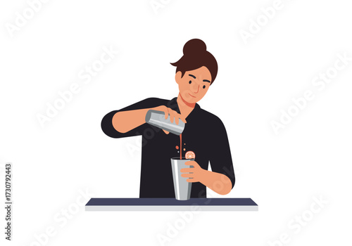 A bartender in a black shirt pours a cocktail from a shaker into a glass on a counter