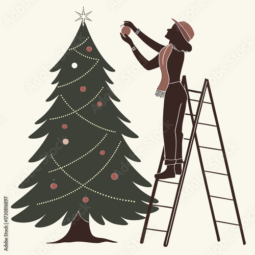 Silhouette of a person decorating a christmas tree
