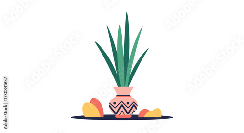 A decorated vase holding tall green leaves stands on a surface next to two appetizing tacos.