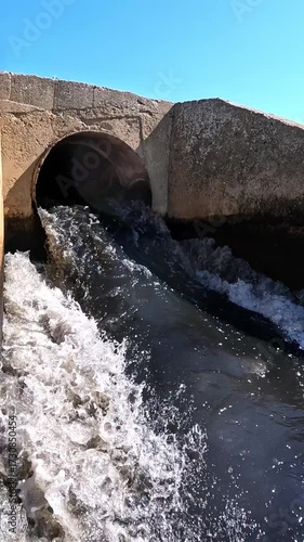 Water pollution, poorly treated wastewater flows into a natural reservoir