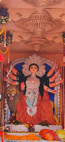 Idol of Goddess Devi Durga at a decorated puja pandal , Durga Puja is a famous and major religious traditional festival of Hinduism that is celebrated throughout the world.
