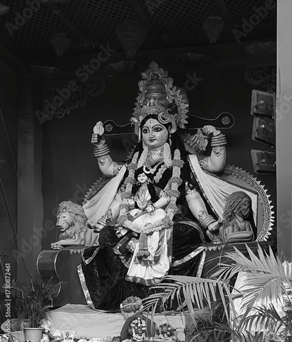 Idol of Goddess Devi Durga at a decorated puja pandal , Durga Puja is a famous and major religious traditional festival of Hinduism that is celebrated throughout the world.
