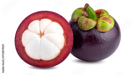 Close-up of a cut and whole mangosteen