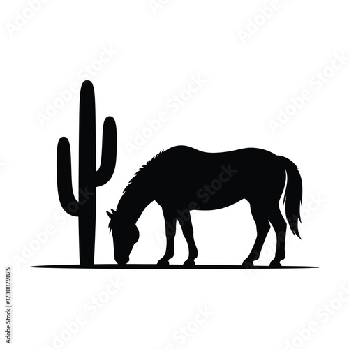 Silhouette of a horse grazing beside a tall saguaro cactus in a desert landscape