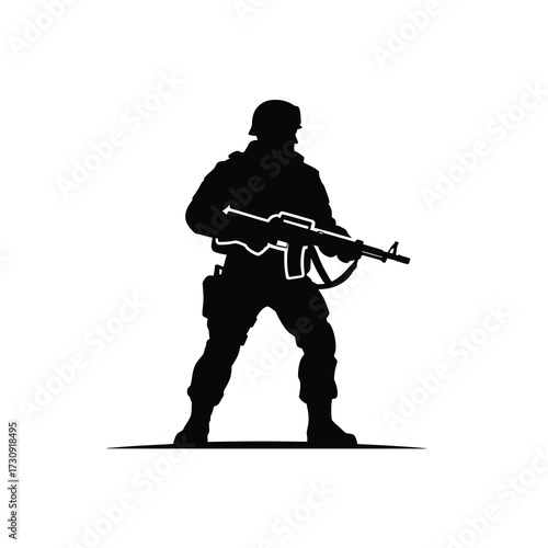 Silhouette of a soldier holding an assault rifle ready for combat duty