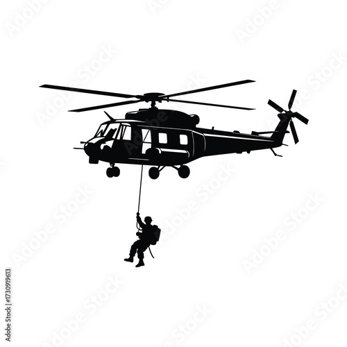 Military helicopter transporting soldier rappelling down during special operations mission