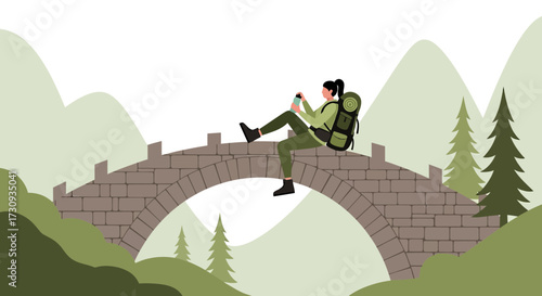 Woman hiker relaxing on a bridge in the mountains enjoying outdoor adventure scene and vacation