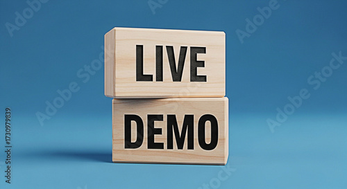 Wooden blocks stacked to display live demo on a blue background for product presentation marketing use
