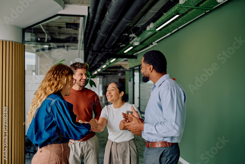 Fotografie Diverse business people meeting and shaking hands, showing team collaboration an