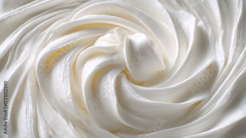 Smooth and Creamy Whipped Topping with Glossy Swirls Perfect for Culinary and Dessert Applications in a Fresh and Inviting Presentation