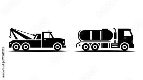 Silhouettes of tow truck and tanker truck in solid black on white background
