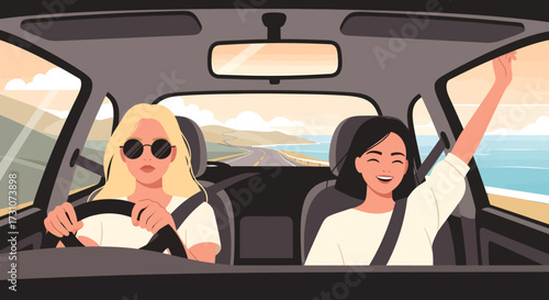 Two women on a road trip driving a car near the ocean.