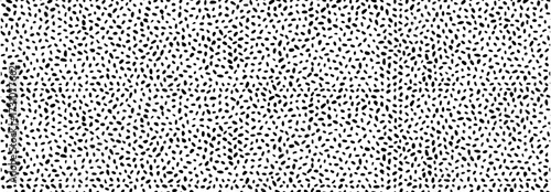 Minimalist irregular tiny polka dot seamless pattern. Hand drawn doodle speckles, blobs and dots background. Doodle texture for seamless baby background, wallpaper or aesthetic playful effect.