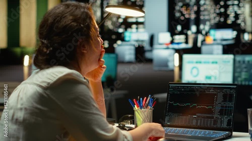 Devastated finance advisor looks at real time money loss and decreasing trends, stock crash causing concern for bankruptcy. Cryptocurrency market fall showcases a financial crisis. Camera B.