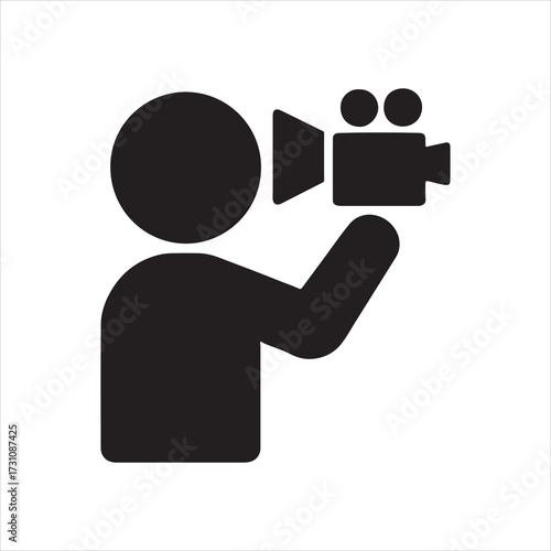Silhouette of person holding video camera symbolizing filmmaking passion and capturing cinematic moments for storytelling through visual arts and professional videography
