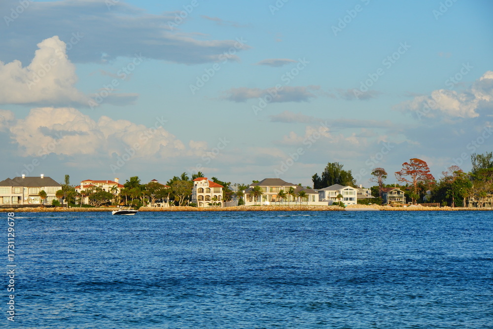 Fototapeta premium Sarasota, Florida USA - Sep 15, 2025: the sarasota beach sun set landscape