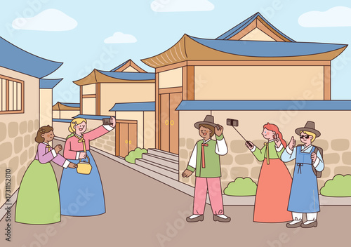 Foreign tourists in hanbok explore Bukchon Hanok Village and take selfies while experiencing Korean traditional culture.